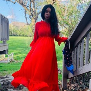 Long sleeve red dress to the ankle on model 5’7 in a half.